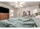 Bedroom with plush carpet and view of bathroom through open doorway at 2177 S Weaver Dr, Apache Junction, AZ 85120