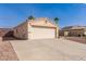 Well maintained single-story home featuring a two car garage and desert landscaping at 2177 S Weaver Dr, Apache Junction, AZ 85120