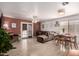 Open concept living room with wood laminate flooring, and lots of natural light at 2177 S Weaver Dr, Apache Junction, AZ 85120