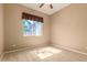 Bedroom with carpet, window, and neutral walls at 22139 N 80Th Ln, Peoria, AZ 85383