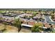 Overhead view showing the community featuring neatly arranged homes with classic terracotta roofs and desert landscaping at 2415 Leisure World --, Mesa, AZ 85206