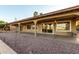 Backyard patio with desert landscaping overlooking the golf course at 2415 Leisure World --, Mesa, AZ 85206