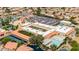 Aerial view of community center with swimming pool, water feature, and meticulously kept grounds at 2415 Leisure World --, Mesa, AZ 85206