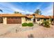 Beautiful single-story home featuring a desert landscape, tile roof, and an attached two-car garage at 2415 Leisure World --, Mesa, AZ 85206