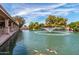 Water feature with a fountain, Koi fish, and ducks creating a relaxing environment by the water at 2415 Leisure World --, Mesa, AZ 85206