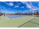 Upgraded tennis courts in a vibrant community setting with clear blue skies at 2415 Leisure World --, Mesa, AZ 85206