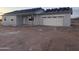 Newly constructed single-story home featuring a two-car garage and desert landscaping at 24184 E King Rd, Florence, AZ 85132