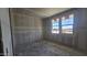 Unfinished bedroom featuring bare drywall, with visible taped seams, two windows allowing natural light at 2706 E Abe Truckle Ave, San Tan Valley, AZ 85140