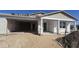 Exterior view of home under construction with framing, windows, and garage visible in a desert landscape setting at 2706 E Abe Truckle Ave, San Tan Valley, AZ 85140