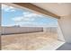 Large backyard featuring privacy wall and dirt for landscaping at 2707 E Abe Truckle Ave, San Tan Valley, AZ 85140