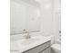 Bathroom with double sinks, neutral cabinets and a combined tub/shower at 2707 E Abe Truckle Ave, San Tan Valley, AZ 85140