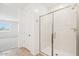 Bathroom featuring tile flooring and glass-enclosed shower at 2707 E Abe Truckle Ave, San Tan Valley, AZ 85140