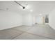 A large, spacious garage with concrete flooring and plenty of room for storage at 2707 E Abe Truckle Ave, San Tan Valley, AZ 85140