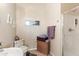 Bathroom with a toilet, framed beach picture and a glass shower stall at 2838 E Vaughn Ct, Gilbert, AZ 85234