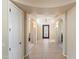 Welcoming foyer boasting arched entryways, neutral paint, and decorative lighting at 2838 E Vaughn Ct, Gilbert, AZ 85234