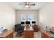 Spacious home office boasts built-in desk and cabinetry, and a large window at 2838 E Vaughn Ct, Gilbert, AZ 85234