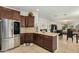 This kitchen boasts granite countertops, stainless steel appliances, and ample cabinet space for storage at 3080 E Palmdale Ln, Gilbert, AZ 85298