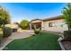 Backyard featuring manicured lawn and patio at 398 W Honey Locust Ave, San Tan Valley, AZ 85140