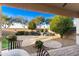 Backyard featuring a seating area with mature landscaping at 398 W Honey Locust Ave, San Tan Valley, AZ 85140