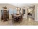 Cozy dining room with a rustic wooden table, setting the stage for Gathering gatherings and warm conversations at 398 W Honey Locust Ave, San Tan Valley, AZ 85140