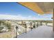 Scenic balcony view featuring modern architecture and a glimpse of the cityscape, offering a serene outdoor living experience at 5000 N Camelback Ridge Rd # 410, Scottsdale, AZ 85251