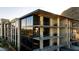 Multi-story condo with large windows, modern balconies, and sleek architectural design offer expansive outdoor living spaces at 5000 N Camelback Ridge Rd # 410, Scottsdale, AZ 85251