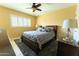 Comfortable bedroom featuring a neutral color scheme, plantation shutters, and plush carpeting at 508 W Harmont Dr, Phoenix, AZ 85021