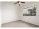 Cozy bedroom featuring neutral carpet, a window, and ample natural light at 510 N Alma School Rd # 266, Mesa, AZ 85201