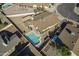 A bird's eye view of the private backyard and pool, surrounded by a neatly kept residential area at 6433 W Beverly Ln, Glendale, AZ 85306