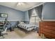 This bedroom features a closet, a ceiling fan, and carpet floors at 6433 W Beverly Ln, Glendale, AZ 85306