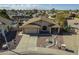 Attractive single-story home showcasing meticulous landscaping, a spacious driveway, and a charming covered porch entrance at 6433 W Beverly Ln, Glendale, AZ 85306