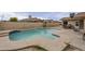 Inviting swimming pool with a Baja step, set in a backyard oasis with mature landscaping at 6433 W Beverly Ln, Glendale, AZ 85306