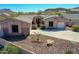 Charming single-story home with desert landscaping and a spacious driveway at 6603 W Via Dona Rd, Phoenix, AZ 85083