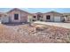 Charming single-story home featuring a low-maintenance desert landscape and two-car garage at 6603 W Via Dona Rd, Phoenix, AZ 85083