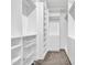 Spacious walk-in closet with adjustable shelving and organization systems at 6603 W Via Dona Rd, Phoenix, AZ 85083