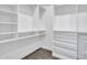 Walk-in closet with custom shelving and ample storage solutions at 6603 W Via Dona Rd, Phoenix, AZ 85083