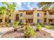 Charming condo community featuring lush landscaping, a water feature, and well-maintained exteriors at 7008 E Gold Dust Ave # 236, Scottsdale, AZ 85253