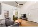 Inviting living room featuring modern furnishings, a ceiling fan, and plenty of natural light at 7008 E Gold Dust Ave # 236, Scottsdale, AZ 85253