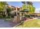 Exterior image of a community BBQ with picnic tables and a grassy lawn at 7008 E Gold Dust Ave # 236, Scottsdale, AZ 85253