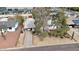 Aerial view of a charming home featuring a covered parking area and mature trees, with easy access to city amenities at 808 W 9Th St, Tempe, AZ 85281