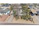 Charming home with mature trees offering shade and beauty, complemented by a convenient covered parking area, as seen from above at 808 W 9Th St, Tempe, AZ 85281