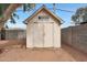 Image of a storage shed with double doors, small window and brick base at 808 W 9Th St, Tempe, AZ 85281