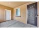 Inviting front porch with a decorative security door and a view of the entryway at 9165 W Mine Trl, Peoria, AZ 85383