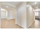 Inviting entry hallway showcasing tile flooring and neutral paint, leading to other living spaces at 9165 W Mine Trl, Peoria, AZ 85383