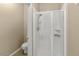 Functional bathroom featuring a glass-enclosed shower and a modern toilet, designed for convenience at 9455 E Raintree Dr # 2032, Scottsdale, AZ 85260