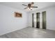 Bedroom featuring hardwood flooring, a ceiling fan, and a painting on the wall at 10228 W Andover Ave, Sun City, AZ 85351