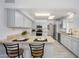 Well-equipped kitchen featuring modern appliances, ample counter space, and stylish cabinetry at 10228 W Andover Ave, Sun City, AZ 85351