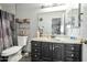 Modern bathroom featuring a marble countertop, a large mirror, and elegant fixtures, creating a spa-like experience at 1030 E Desert Moon Trl, San Tan Valley, AZ 85143