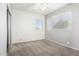 Light filled bedroom with two windows and carpeted floors features lots of natural light at 10452 E Florian Ave, Mesa, AZ 85208