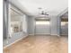 Spacious living room featuring tile floors, neutral walls and ample natural light at 10452 E Florian Ave, Mesa, AZ 85208
